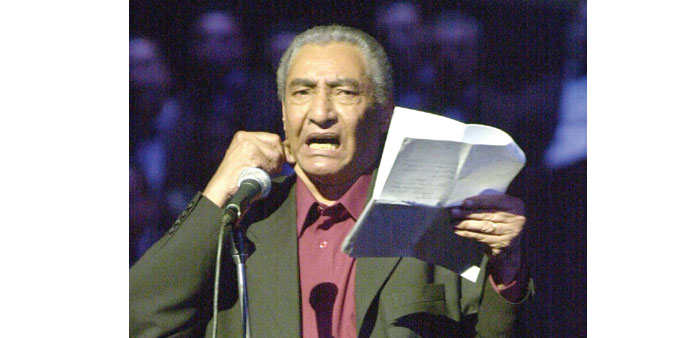  Abnudi reads a poem at the Cairo Opera House during a special concert held in support of Palestinians, in this May 2, 2002 file photo. 