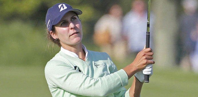 Jennifer Johnson hits her third shot on the 18th hole during the first round of the ShopRite LPGA Classic in Galloway, New Jersey.  