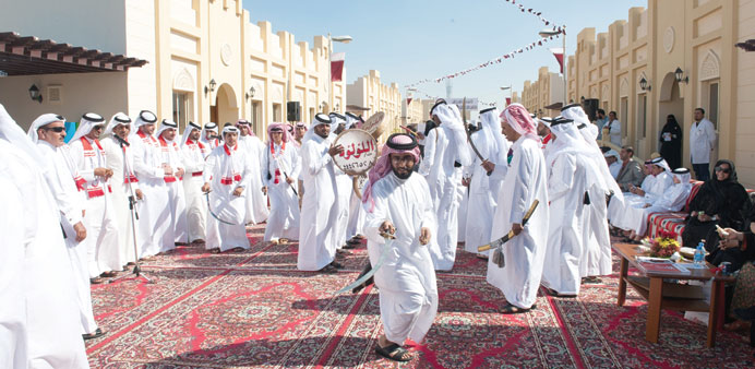 Some of the participants perform a sword dance during the event.