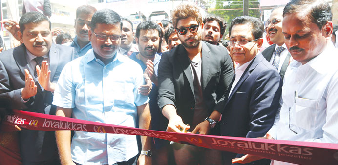 Allu Arjun inaugurates one of the showrooms as company officials look on.