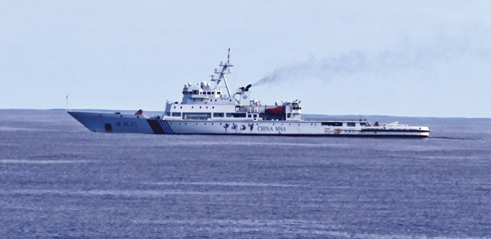 Chinese patrol ship Haixun 01 is pictured during a search for the missing Malaysia Airlines flight MH370, in the southern Indian Ocean yesterday.