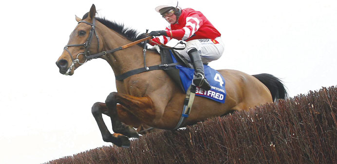 Nico de Boinville on Coneygree clears a fence on his way to winning the 15.20 Betfred Cheltenham Gold Cup yesterday.