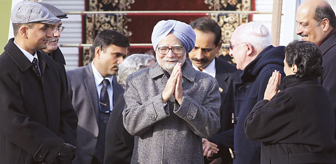 Prime Minister Manmohan Singh greets Indian officials in a welcoming ceremony upon his arrival at Moscowu2019s Vnukovo airport yesterday.