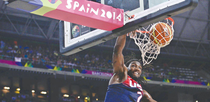 US forward Kenneth Faried scores during their World Cup quarter-final against Slovenia in Barcelona on Tuesday. (AFP)