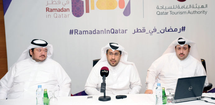 Al-Ibrahim and other QTA officials speaking to the media.