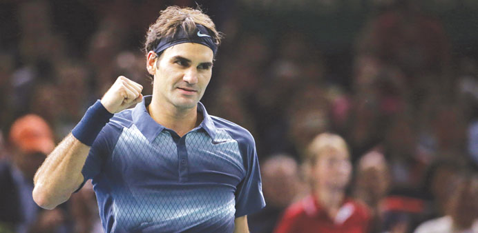 Roger Federer (left) will take on Novak Djokovic in the Paris Masters semi-finals today.