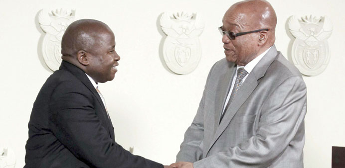 South Africau2019s President Jacob Zuma congratulates new Finance Minister David van Rooyen during a ceremony at the Union building in Pretoria yesterday.