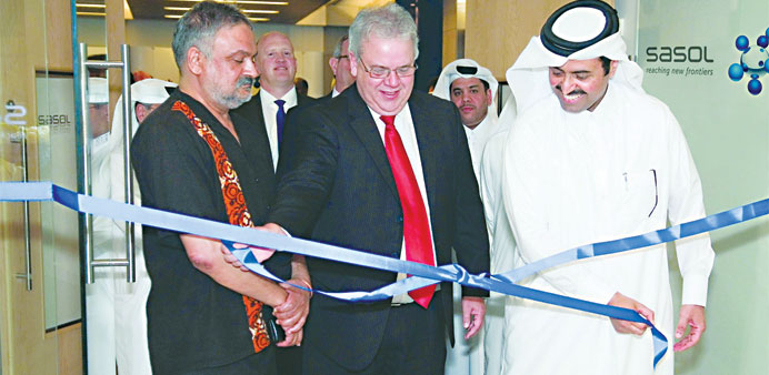 Al-Sada with Strauss (centre) and Cachalia at the opening of Sasol Qatar office.