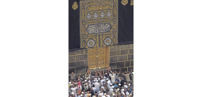 Muslim pilgrims pray around the holy Kaaba at the Grand Mosque in Makkah.