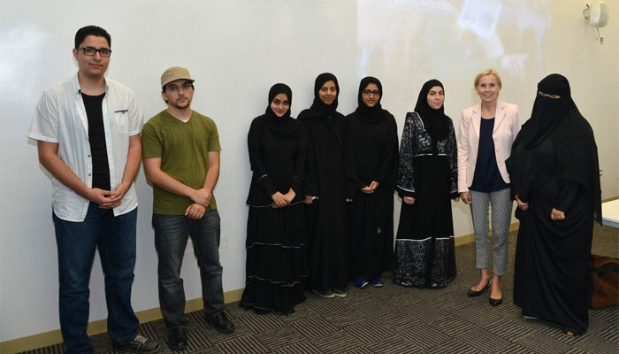 Some of the first students of the College of Medicine at QU with a mentor
