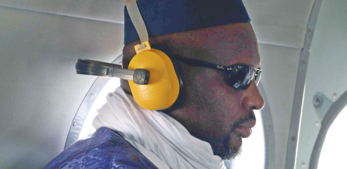 Maliu2019s Prime Minister Moussa Mara on board a UN helicopter to Kidal.