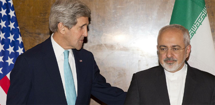 U.S. Secretary of State John Kerry (L) meets his Iranian counterpart Mohammad Javad Zarif  