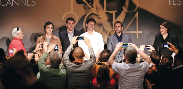 Actors Mark Ruffalo (left), Channing Tatum, and Steve Carell with director Bennett Miller (second right) at the press conference for Foxcatcher in Can