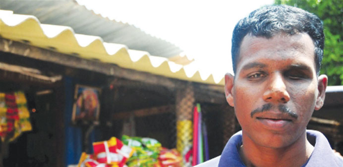 Rasalingam Sivakumar, a former LTTE combatant, struggles to look after his wife and children.