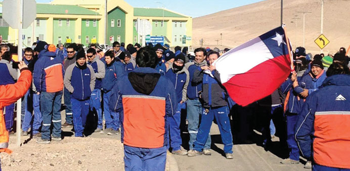 Workers of the Escondida mine protest outside the mine compound in Antofagasta, Chile.