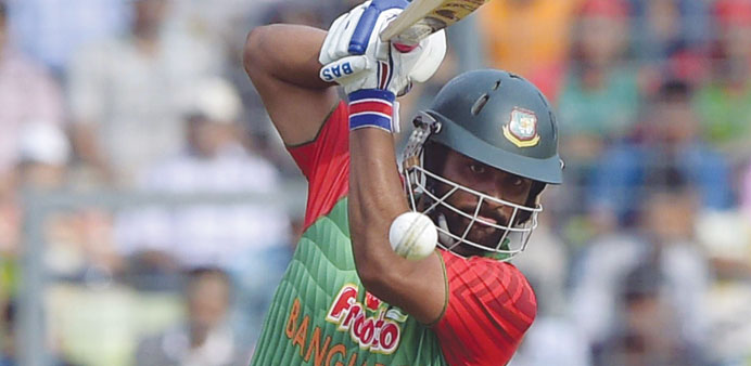 Bangladeshu2019s Tamim Iqbal plays a shot during his 132 off 135 balls in Dhaka. (AFP)