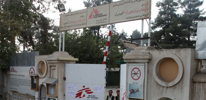 Afghan guards stand at the gate of Medecins Sans Frontieres (MSF) hospital 