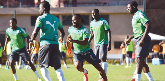 Ivory Coastu2019s Didier Drogba (left) takes part in a training session in Aguas de Lindoia, earlier this week. (AFP