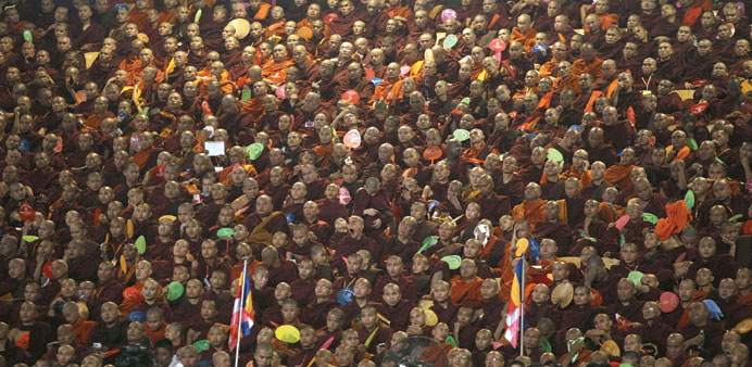 Thousands of monks from Myanmaru2019s Ma Ba Tha Buddhist nationalist movement gather in a sports stadium in Yangon yesterday.