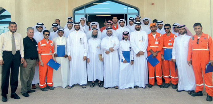 The confirmed trainees with RasGas officials.