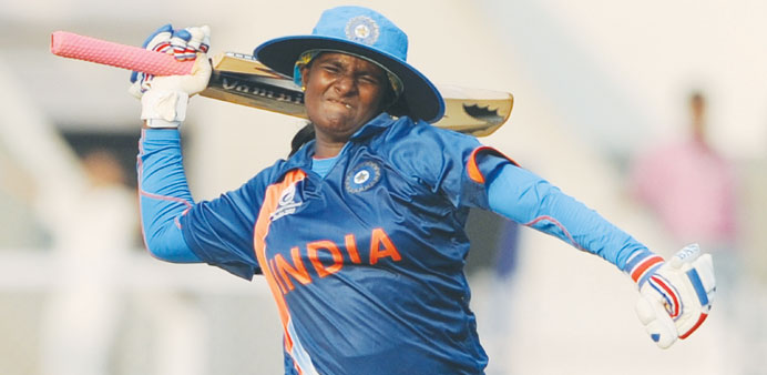 Indiau2019s Thirush Kamini celebrates her century during the inaugural match of the ICC Womenu2019s World Cup 2013 against West Indies at the Brabourne Stadiu