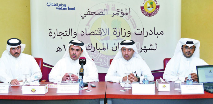 Sheikh Jassim bin Jaber al-Thani and Abdulrahman Hamad Sraiya al-Kaabi, flanked by MEC officials, announcing the Ramadan initiative yesterday.