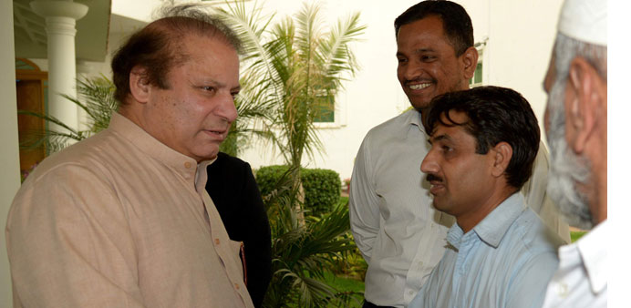  Former Pakistani prime minister and head of the Pakistan Muslim League-N Nawaz Sharif meets party supporters at his residence in Lahore yesterday.