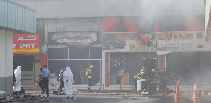 Civil Defence personnel in action. PICTURES: Hussein Ali.