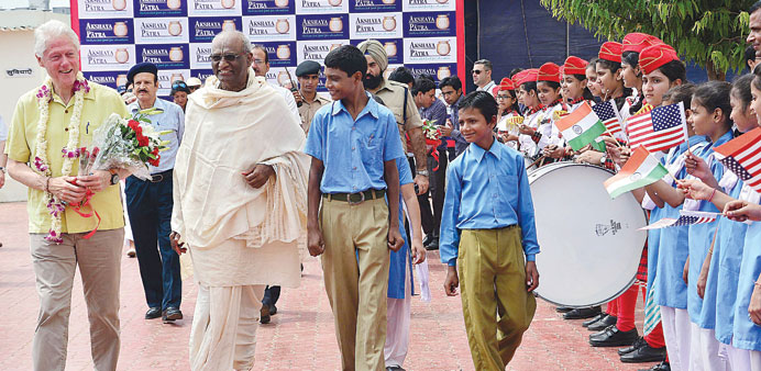 Former US president Bill Clinton visits the Akshay Patra Kitchen and Sanskrit School in Jaipur.