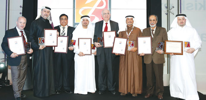 HMC chairman of Surgery Dr Abdallah al-Ansari (second left) with some of the other prize winners.