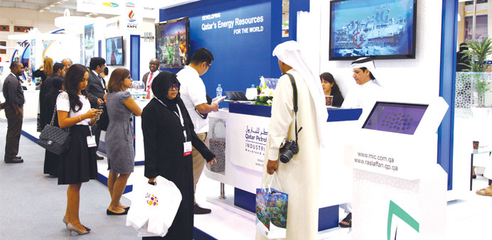 Guests visiting the QP stand at Petrotech 2014.