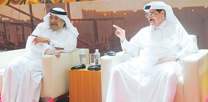 HE Sheikh Faisal bin Qassim al-Thani and HE Dr Hamad bin Abdulaziz al-Kuwari interact with the audience at the event