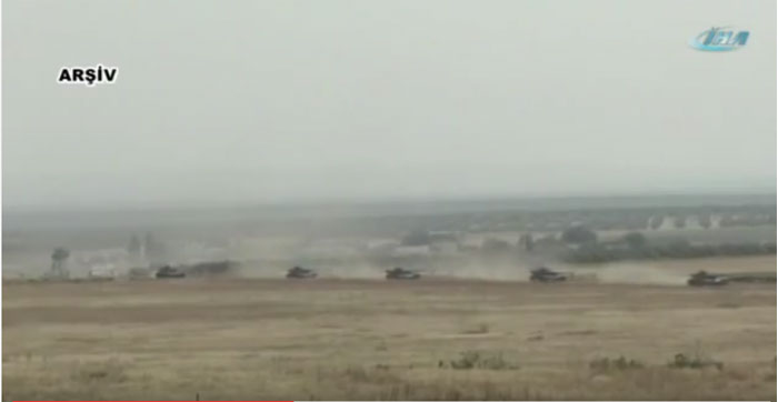 Armoured vehicles of the Turkish army moving along Daglica region. Image grab from a video uploaded into YouTube.