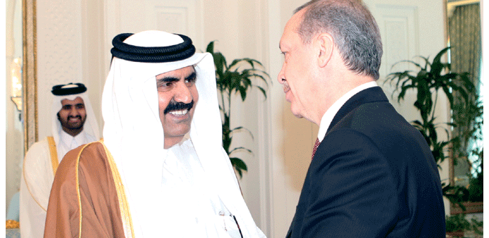HH the Emir Sheikh Hamad bin Khalifa al-Thani receiving Turkish Prime Minister Recep Tayyip Erdogan at the Emiri Diwan yesterday.