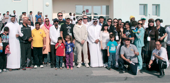 Mowasalat chairman Jassim Saif al-Sulaiti with participants at the celebrations.