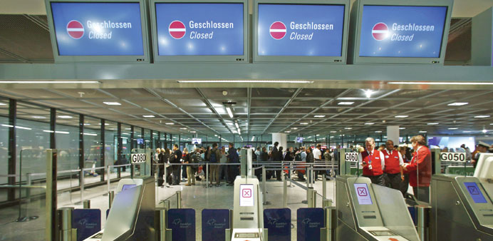 Security gates are closed during a strike yesterday in Frankfurt airport.