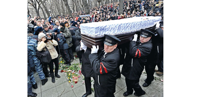  Pallbearers carry Nemtsovu2019s coffin after the memorial service at the Andrei Sakharov rights centre.