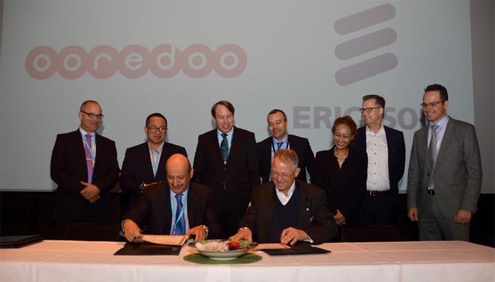 Ooredoo and Ericsson officials at the signing ceremony.