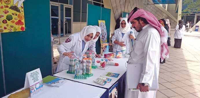 Visitors seeking information about oral health at one of the events to mark the World Oral Health Day and the GCC Oral Health Week.