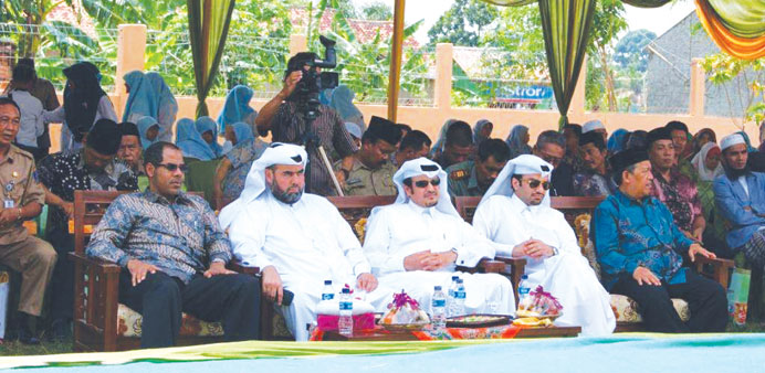 Qatar Charity and Indonesian officials during the inauguration of the project.