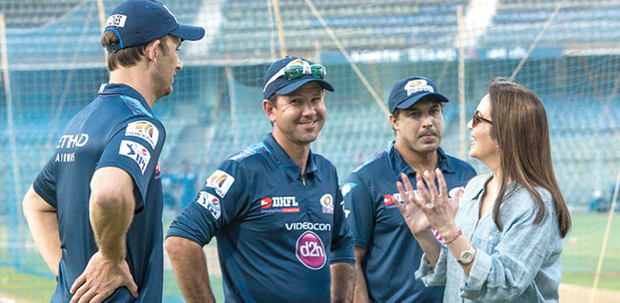 Mumbai Indians owner Neeta Ambani with coach Ricky Ponting and other team staff during a training session.