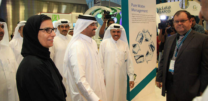 HE Dr Mohamed bin Saleh al-Sada visiting the Qatalum stand at the 8th Qatar Petroleum Environmental Fair.