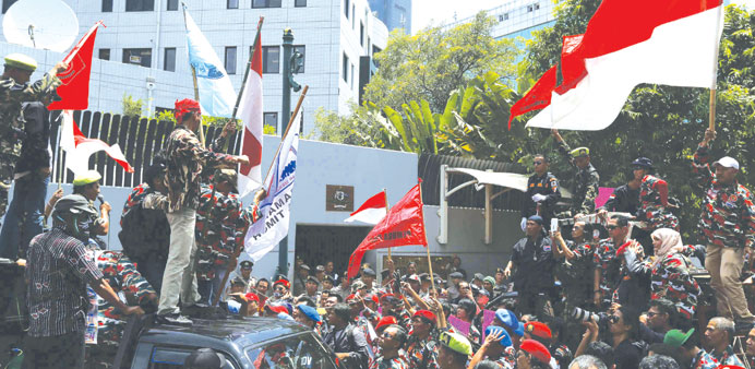 Protesters shout slogans during a demonstration in front of the Australian embassy in Jakarta.