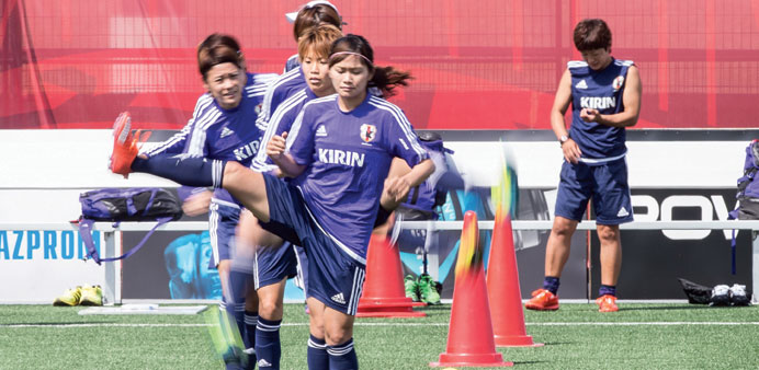 Japanese players run through some drills during their training session in Edmonton, Canada.