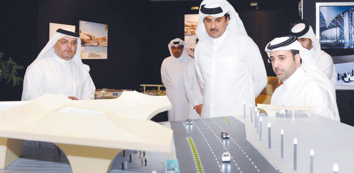 HH the Emir Sheikh Tamim bin Hamad al-Thani being briefed by officials of Qatar Rail Company yesterday.