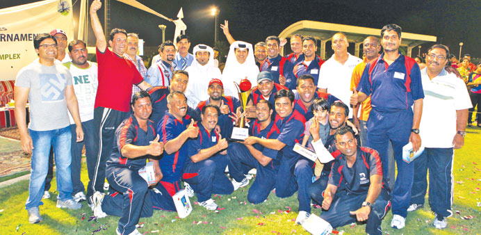 Abdulaziz al-Obaidli with the victorious RLIC team and the organising committee.