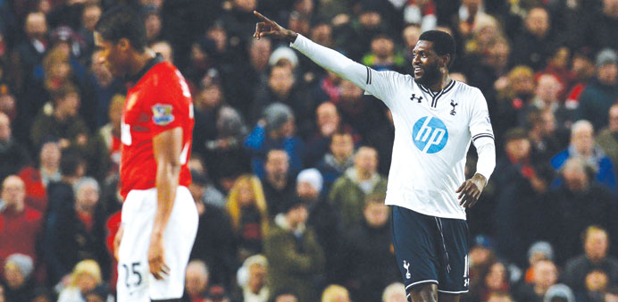 Tottenham Hotspuru2019s Emmanuel Adebayor celebrates after scoring a goal during their EPL match against Manchester United at Old Trafford on Wednesday. (