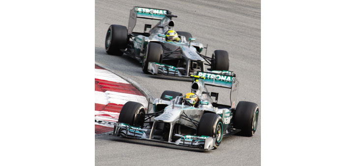 Lewis Hamilton and Nico Rosberg in action.