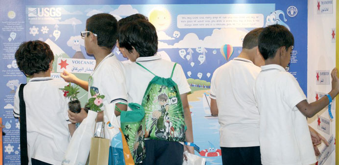 School children at the ConocoPhillips pavilion at the QP Environment Fair.