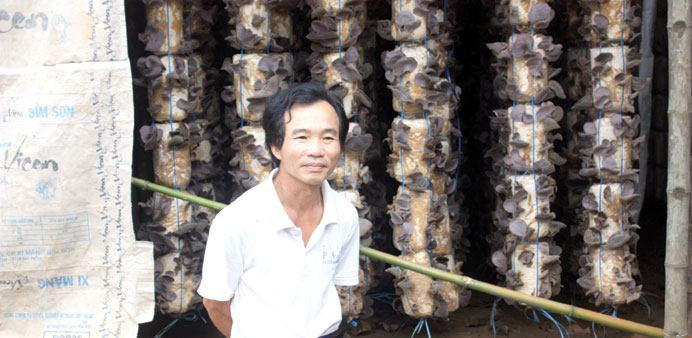 * Double amputee Dang has been farming mushrooms since 2003.
